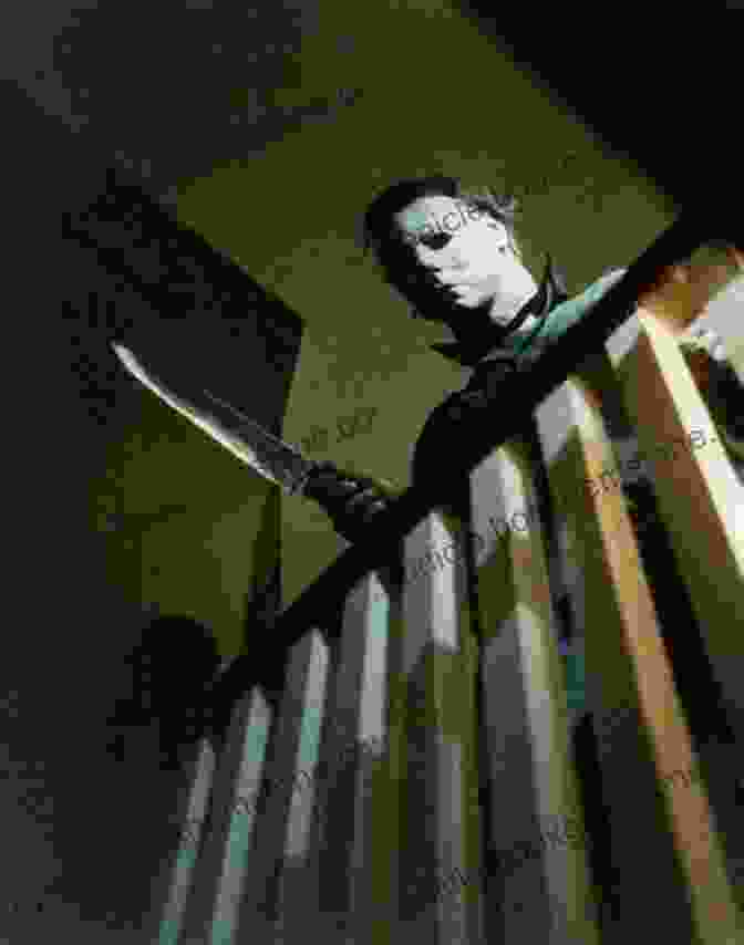 A Color Still From Halloween (1978),Depicting Michael Myers Wearing His Signature White Mask And Holding A Bloody Knife. The Horror Show Guide: The Ultimate Frightfest Of Movies